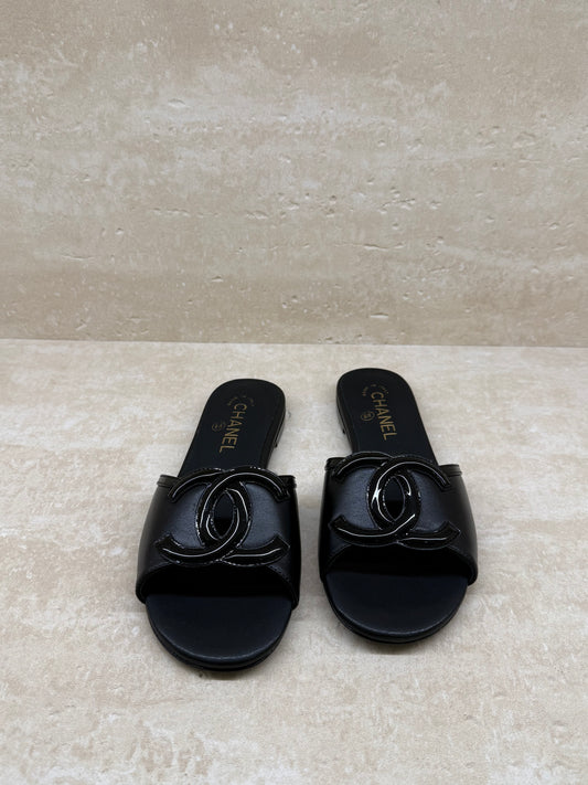 Chanel Mules — Black Patent